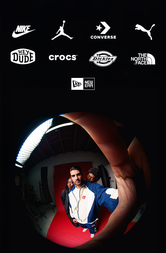 A promotional image featuring logos from brands including Nike, Jordan, Converse, Puma, Hey Dude, Crocs, Dickies, The North Face, and New Era at the top, with a fisheye lens photo below showing three people posing in urban clothing against a red backdrop.